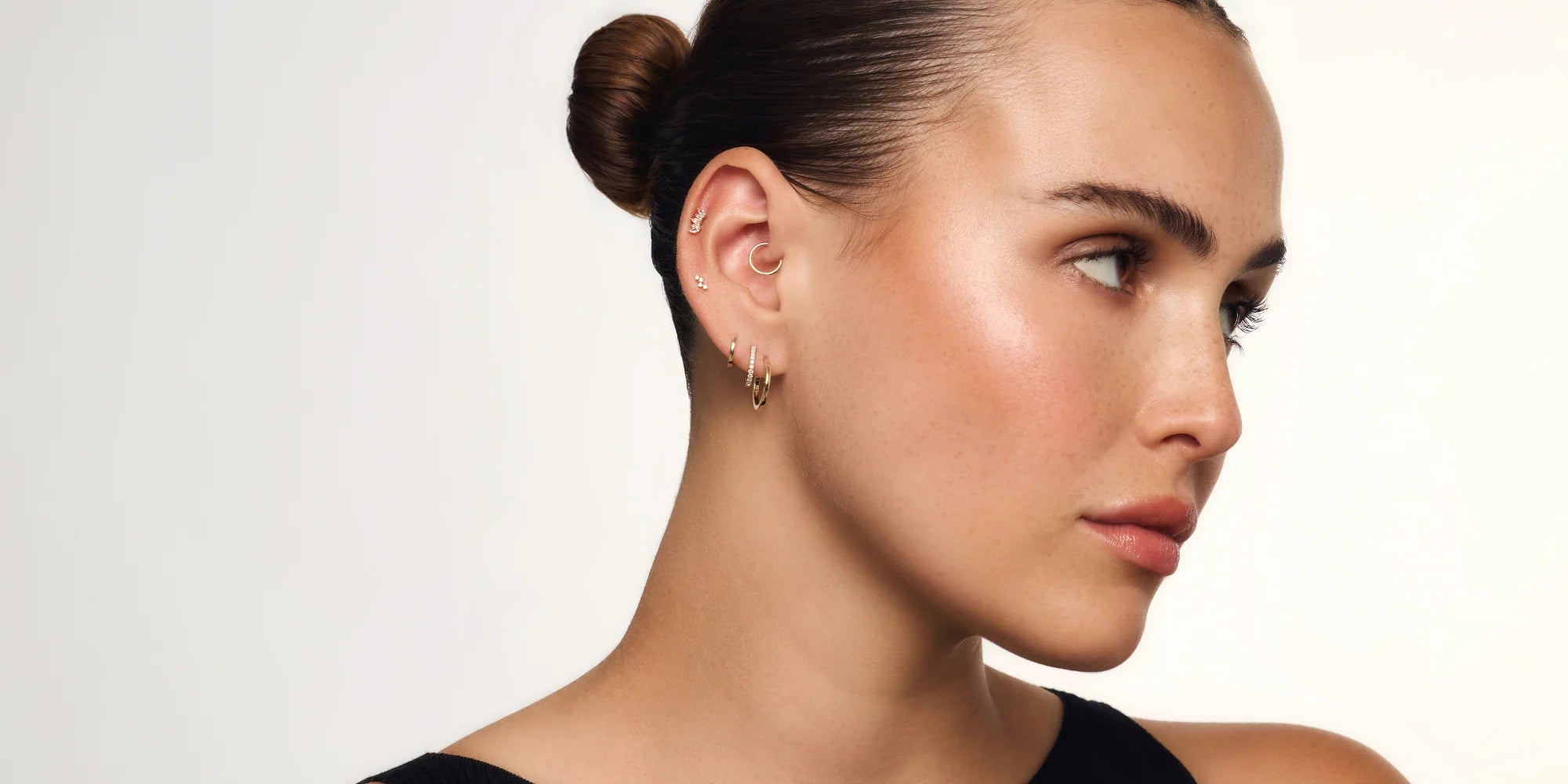 Eline Rosina | Gold piercings & earrings | Luxury ear styling