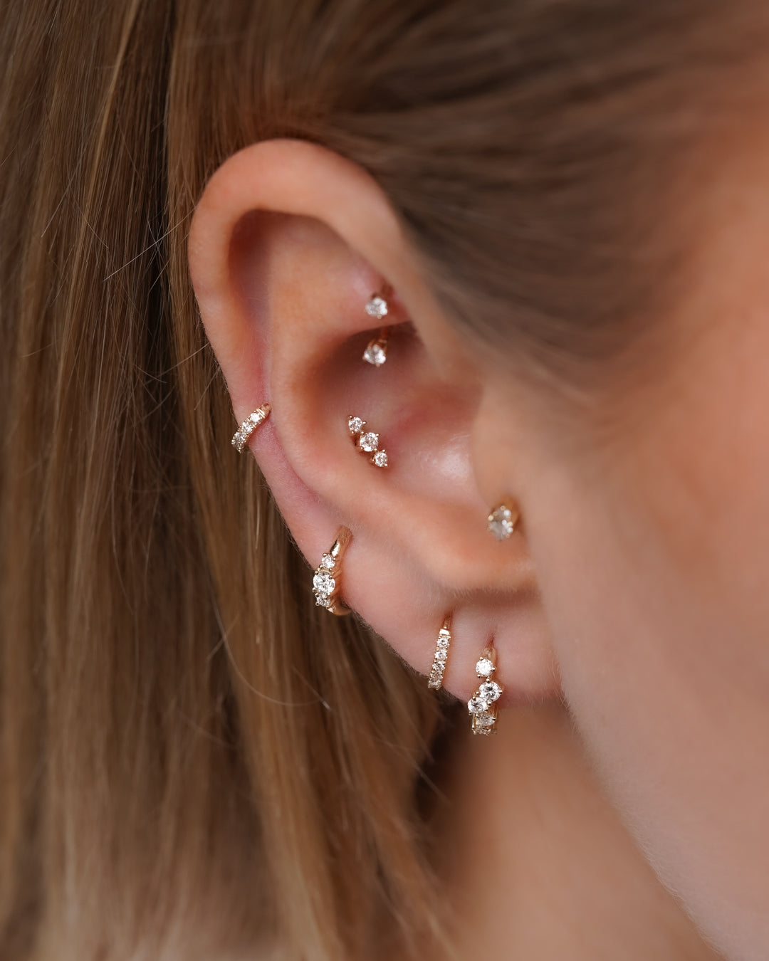 Inner vs outer conch piercing: welke kies je?